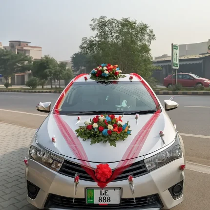 Lahore Blooms red ribbon wedding car decoration with mixed roses