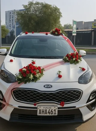 Lahore Blooms red roses wedding car decoration front view