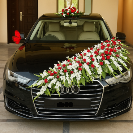 Lahore Blooms red and white garland bridal car décor on black Audi sedan