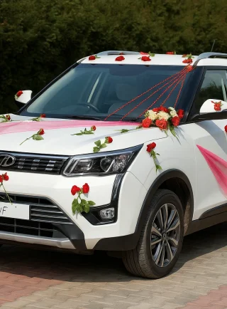 Lahore Blooms pink and red wedding car decoration on white SUV
