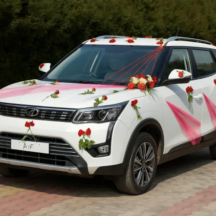 Lahore Blooms pink and red wedding car decoration on white SUV