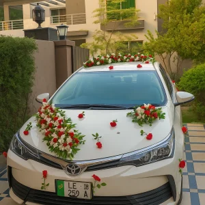 Lahore Blooms red and white bridal car decoration on white Toyota Corolla