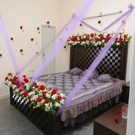Purple Net & Red Roses Wedding Room Decoration – Classic Bed Setup