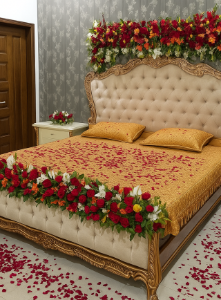 Wedding night bridal room flower decoration with bed covered in rose petals – Lahore Blooms