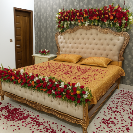 Wedding night bridal room flower decoration with bed covered in rose petals – Lahore Blooms
