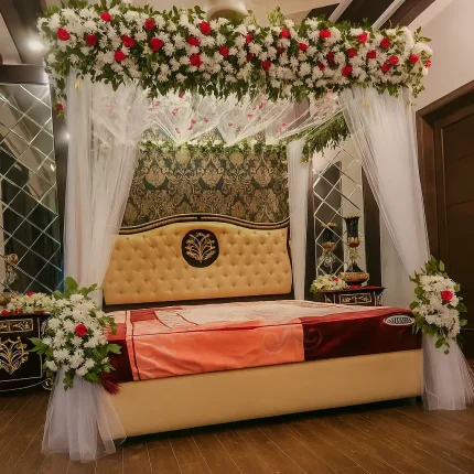 Luxury bridal room canopy decoration with white and red flowers – Lahore Blooms