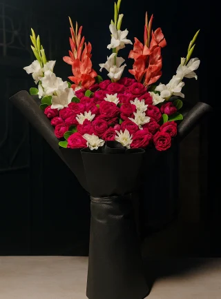 Grand red rose and gladiolus bouquet in black wrapping – Lahore Blooms
