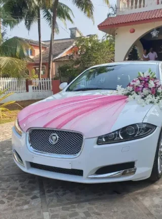 Pink Drape & Lilac Flowers Wedding Car Decoration – White Jaguar