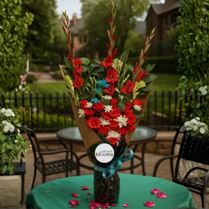 Tall standing bouquet with red gladiolus, red roses, white daisies and greenery in kraft wrapping – Lahore Blooms