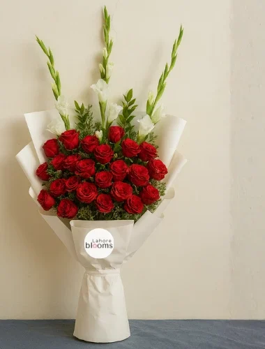 Red roses and white gladiolus bouquet wrapped in white paper – Lahore Blooms