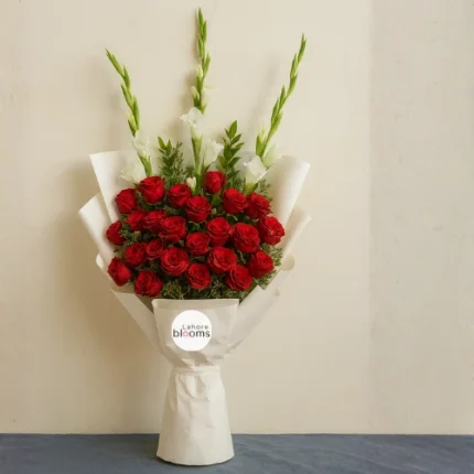 Red roses and white gladiolus bouquet wrapped in white paper – Lahore Blooms