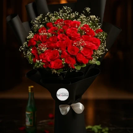 Luxury red roses bouquet with baby’s breath in black wrapping and white bow – Lahore Blooms