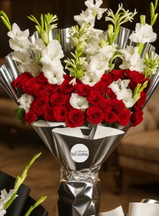 Large red roses and white gladiolus bouquet in metallic silver wrapping – Lahore Blooms