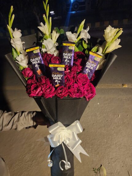 Luxury red roses and chocolate bouquet in Lahore with Dairy Milk chocolates