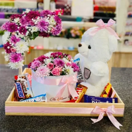 flowers and teddy bear gift basket Lahore