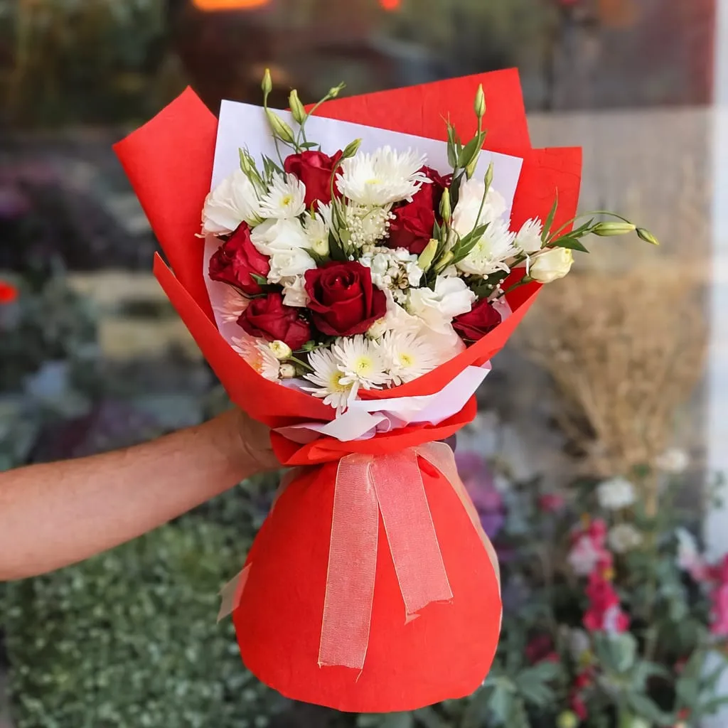 lily red rose and white lily bouquet in lahore premium red wrapping
