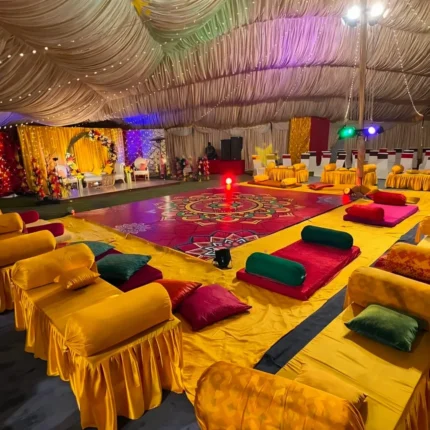 Luxury mehndi event decoration in Lahore with full marquee seating and stage setup