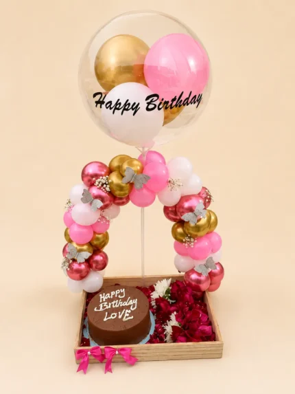 Blush Halo birthday cake and balloon gift basket with flowers and Happy Birthday bubble balloon in Lahore